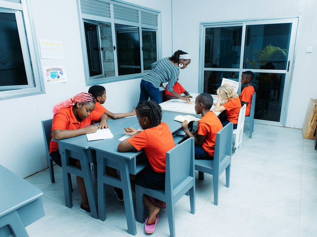 group of diverse students learning programming